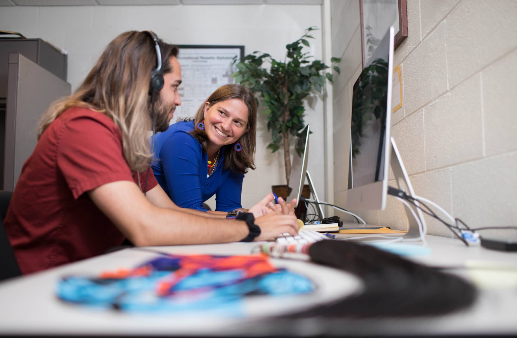 Dr. Kristin Hedges addresses student